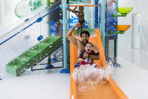 Britannia Leisure Centre dad and daughter on slide